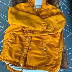 light fuzzy mustard colored jacket